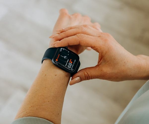 A collection of fitness tracking app screens on a phone.